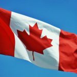 Image of the Canadian flag waving in the wind.