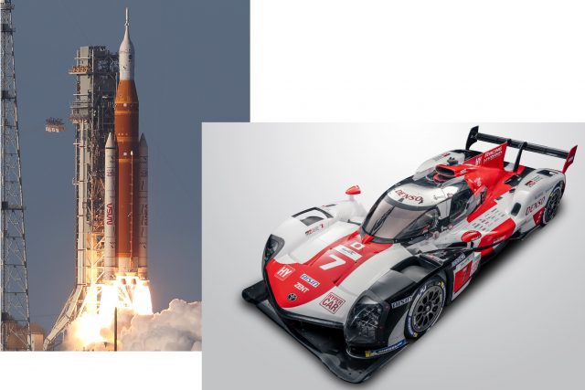 Image is a composite of the NASA SLS, a large orange coloured rockets with two white side boosters taking off and on the right is a picture of a red and white Toyota Race car used in the Lemans series races.